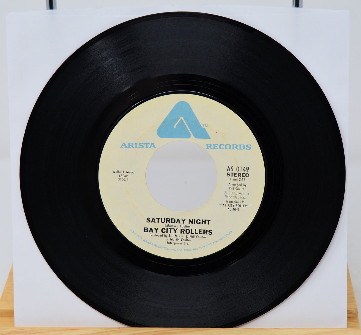 Vinyl record with 'Arista Records' label on a white background