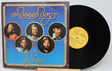 Vinyl record with cover featuring 'The Beach Boys' on a white background