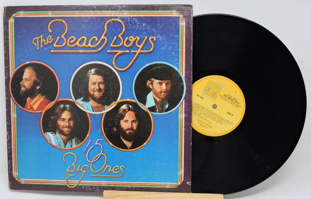 Vinyl record with cover featuring 'The Beach Boys' on a white background