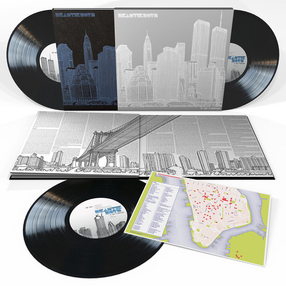 Vinyl records with city skyline design and a map included