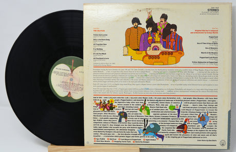 Vinyl record with colorful cover art displaying track listings and illustrations.