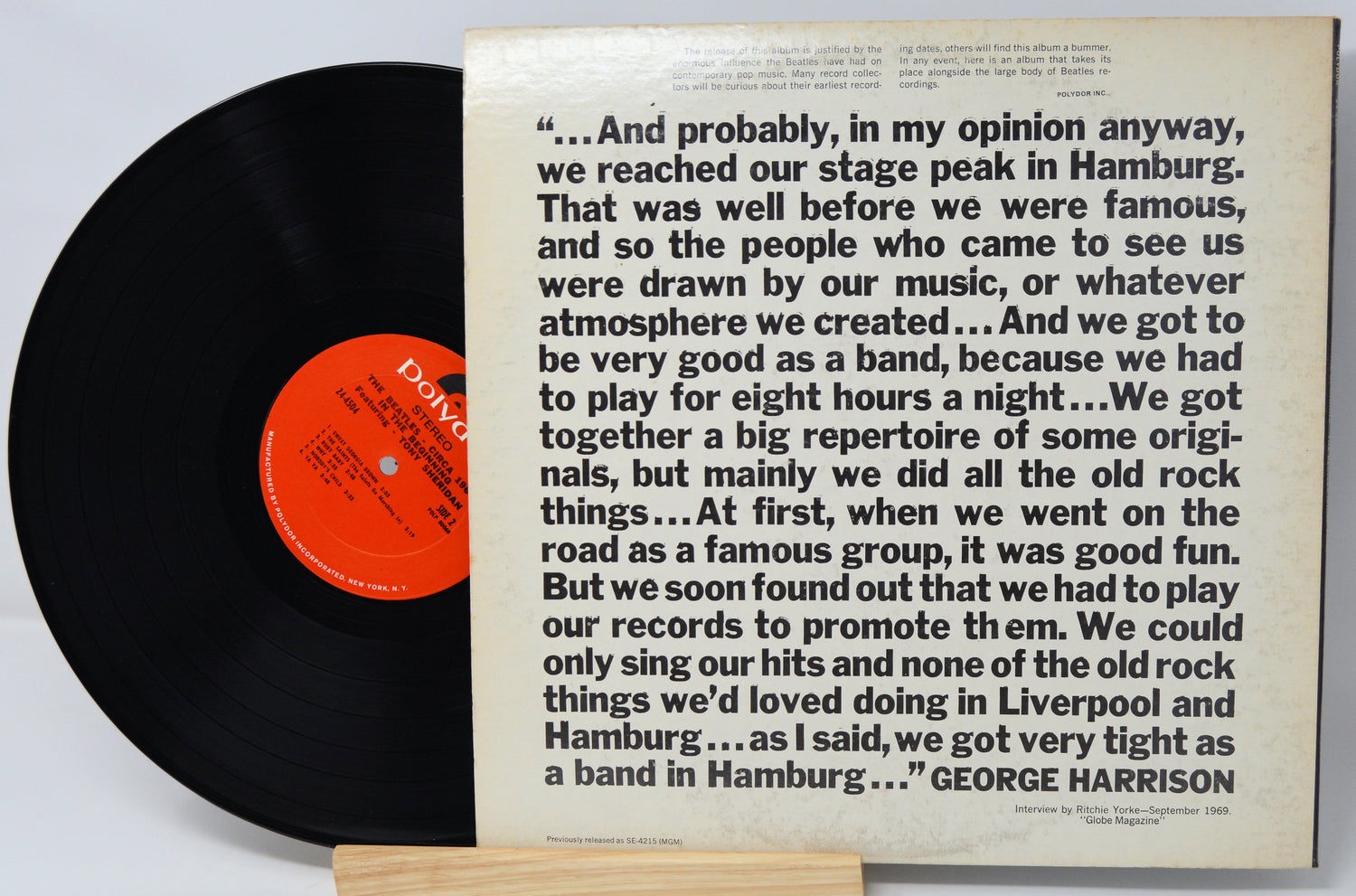 Vinyl record with a quote on a white background