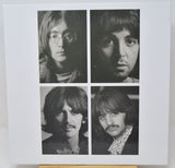 Black and white portraits of four individuals arranged in a 2x2 grid on a light background.