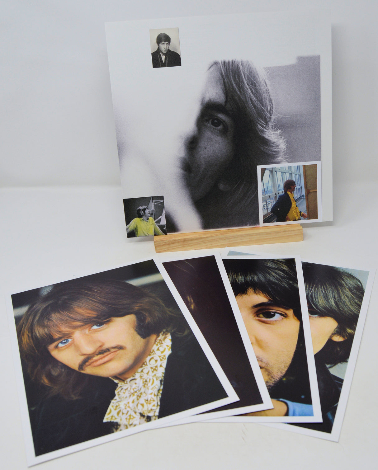Collection of black and white photos of a person on a white surface