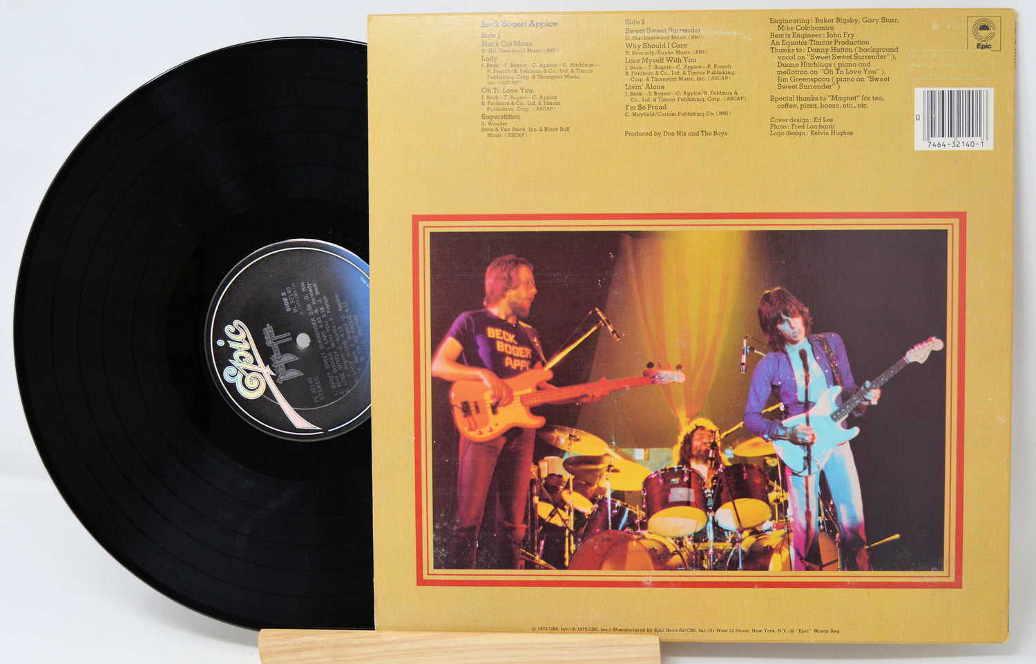 Vinyl record with a colorful cover featuring a band and text