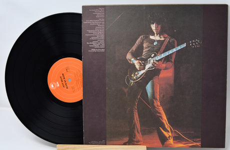 Vinyl record with a guitar player on the cover