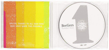 Opened Bee Gees Number Ones CD case showing disc and a colorful thank you note to fans