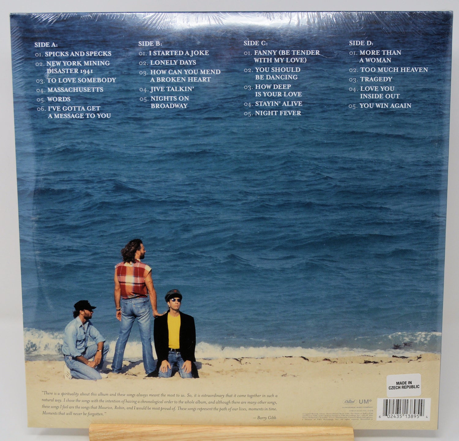 Vinyl record sleeve with beach scene and tracklist