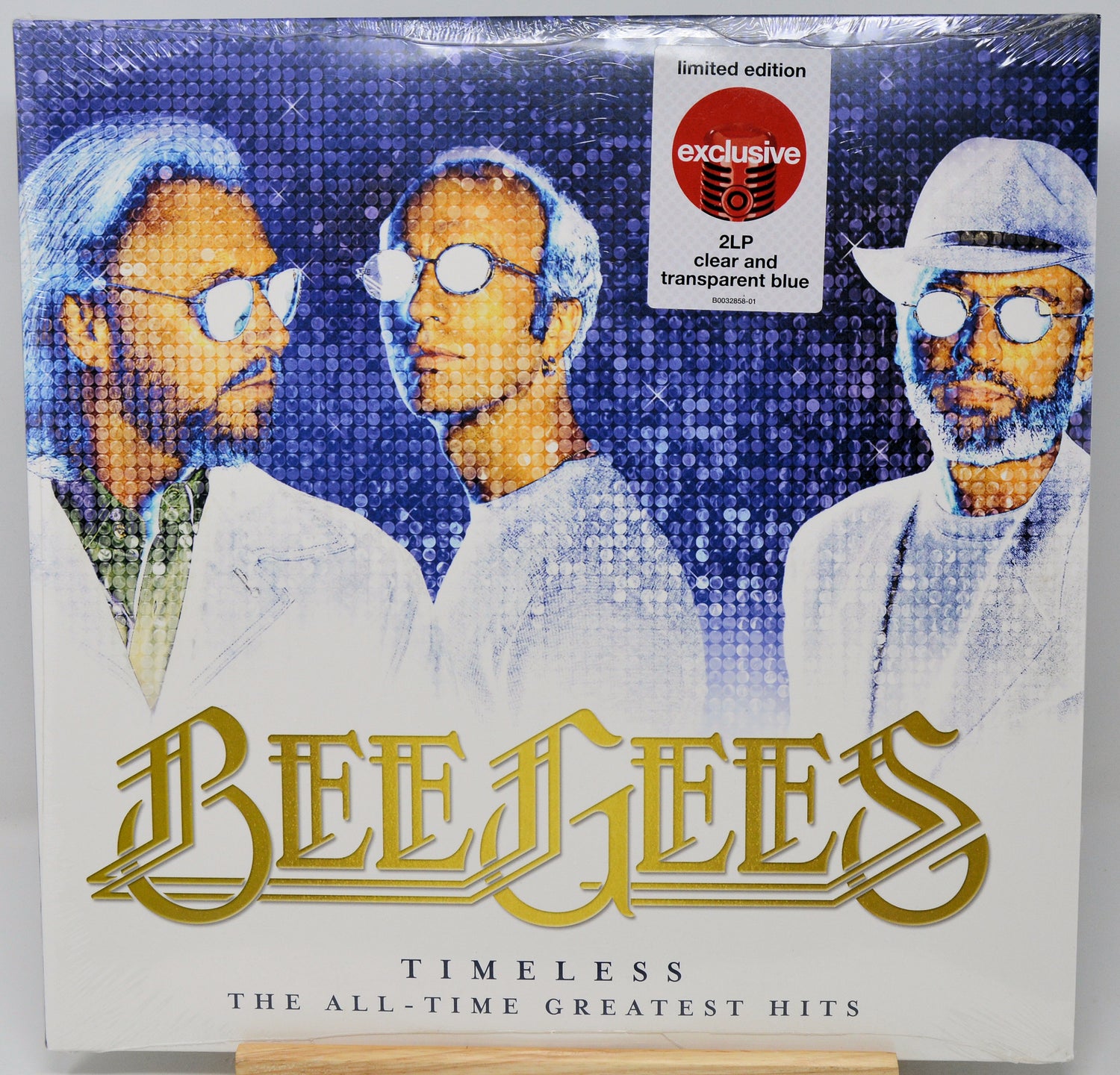 Vinyl record cover for Bee Gees 'Timeless: The All-Time Greatest Hits' with a blue and white color scheme.