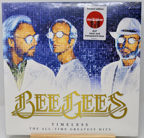 Vinyl record cover for Bee Gees 'Timeless: The All-Time Greatest Hits' with a blue and white color scheme.