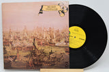 Vinyl record with a detailed cover illustration of ships and text 'Bee Gees Trafalgar'.