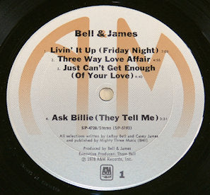 Close-up of Bell & James vinyl record label showing song titles and credits
