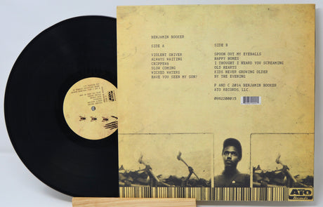 Back cover and vinyl record of Benjamin Booker's self-titled album with tracklist and barcode