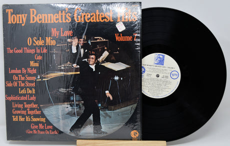 Vinyl record with cover featuring Tony Bennett's 'Greatest Hits' on a white background
