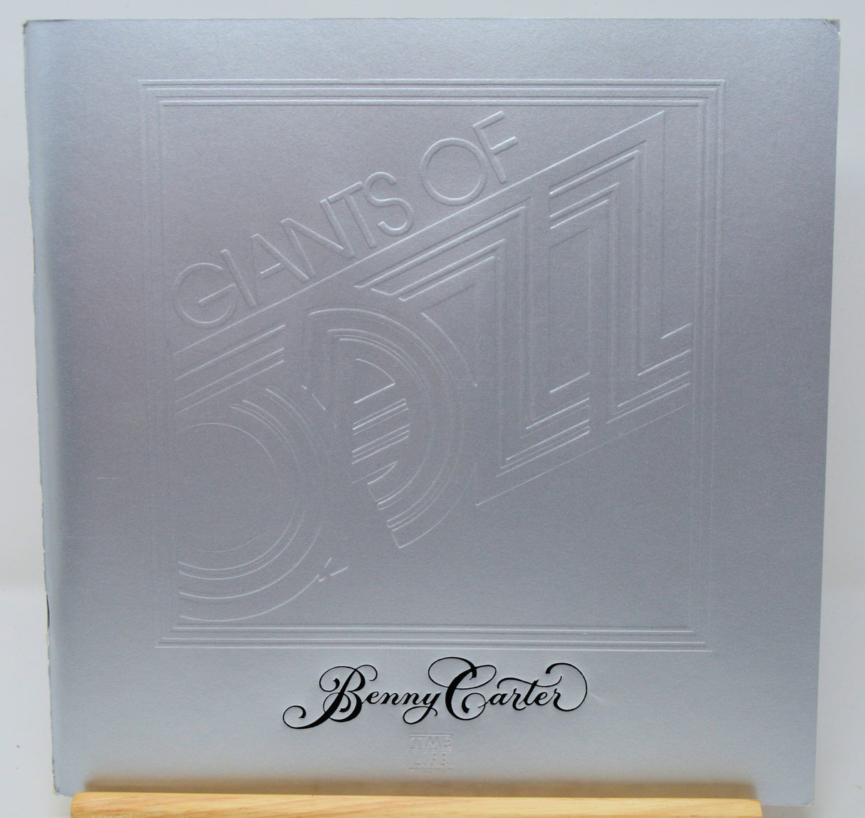 Embossed silver album cover for Giants of Jazz featuring Benny Carter