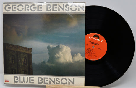 Vinyl record with cover featuring a building and cloud, labeled 'Blue Benson' by George Benson.