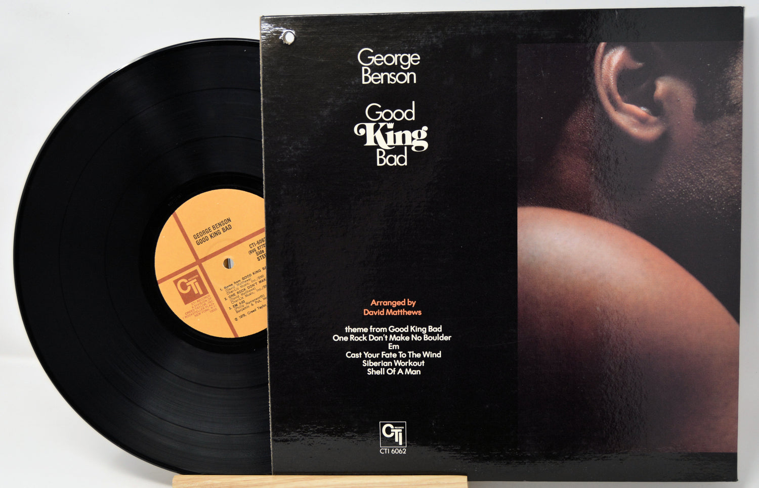 Vinyl record and cover of 'Good King Bad' by George Benson on a white background