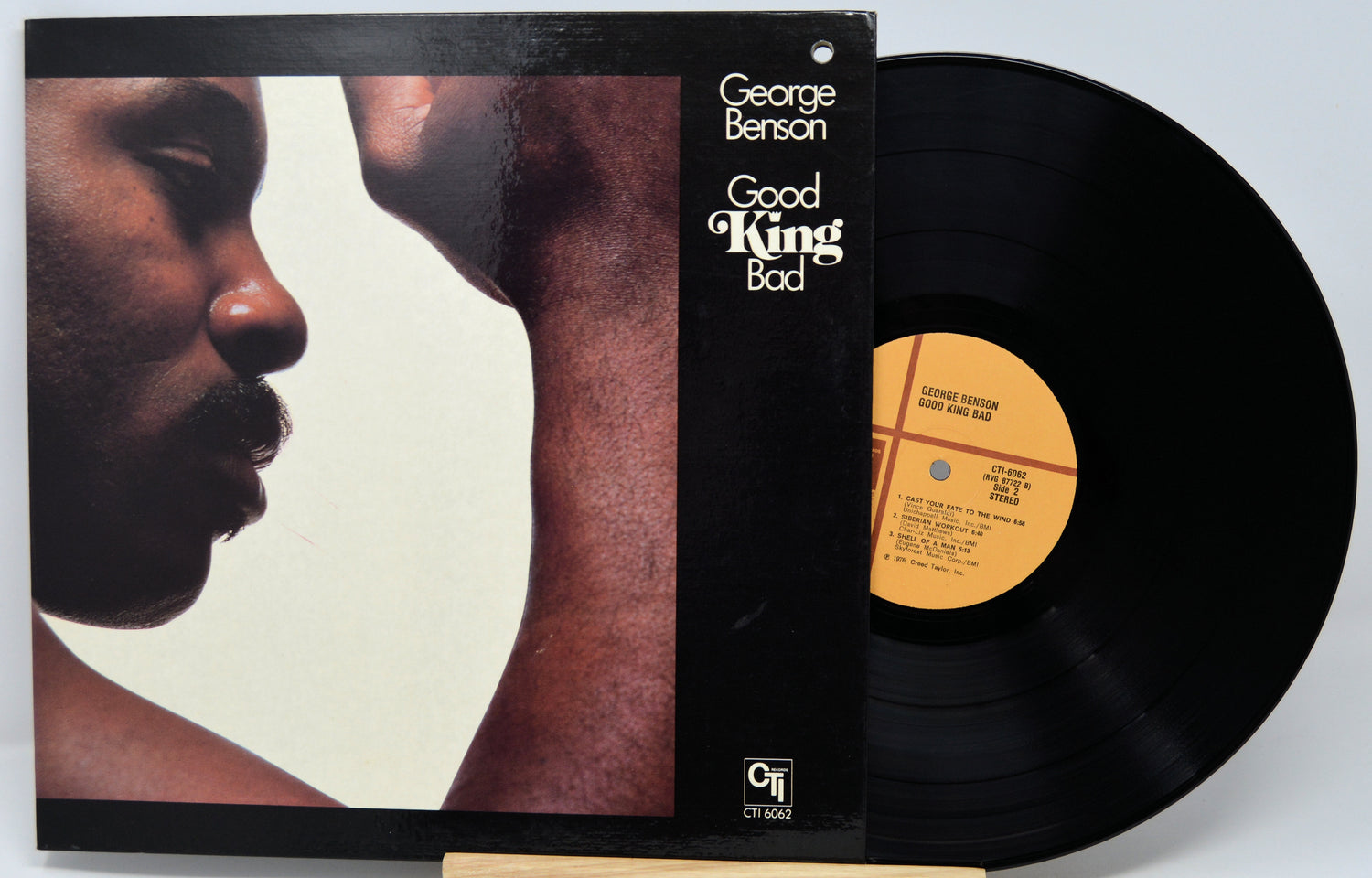 Vinyl record with cover featuring a close-up of a person's face, titled 'Good King Bad' by George Benson.