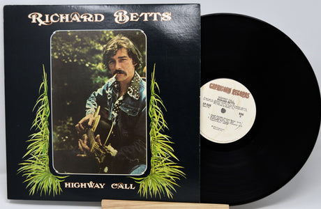Vinyl record with cover featuring a person holding a guitar, titled 'Highway Call' by Richard Betts.