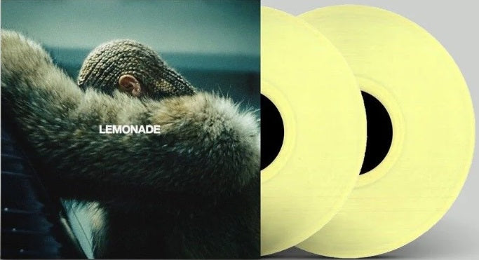 Vinyl record with 'LEMONADE' text and a person wearing a knit hat and scarf.