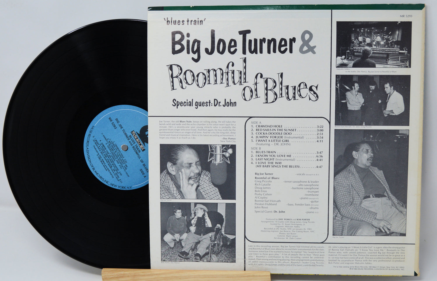 Vinyl record with its back cover featuring Big Joe Turner and Roomful of Blues on a white background