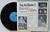 Vinyl record with its back cover featuring Big Joe Turner and Roomful of Blues on a white background