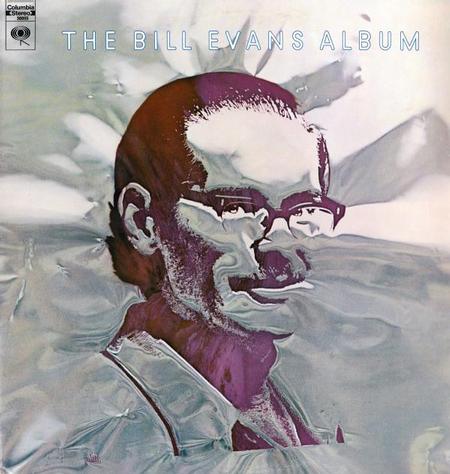 Album cover of 'The Bill Evans Album' with a stylized illustration of a person wearing sunglasses.
