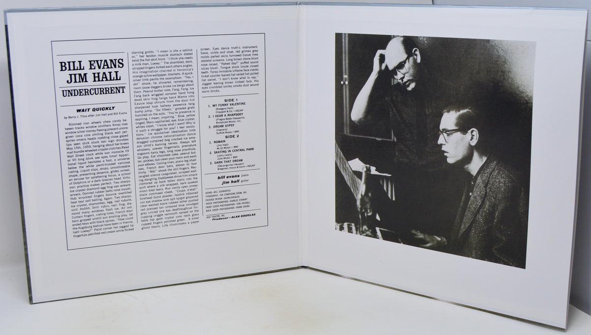 An open book or magazine spread showing a printed article on the left page with the headline 'Bill Evans Jim Hall Undercurrent' and a black-and-white photograph on the right page depicting two men seated at a piano.