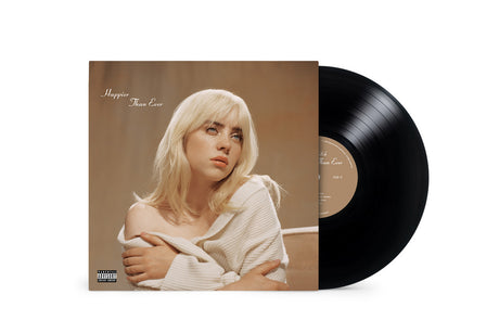 The image shows a vinyl record of Billie Eilish's album 'Happier Than Ever' with the album cover featuring a photograph of Billie Eilish in a relaxed pose.