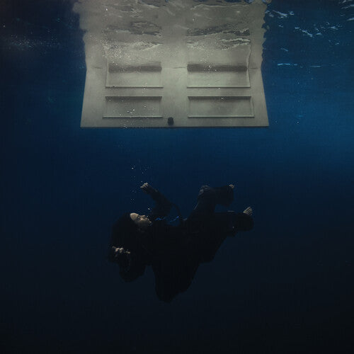 Billie Eilish 'Hit Me Hard And Soft' showing a person underwater looking up at a submerged door