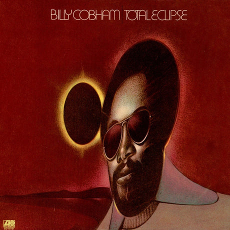 Album cover with a stylized portrait of a person wearing sunglasses and an eclipse effect, featuring the text 'Billy Cobham Total Eclipse'.