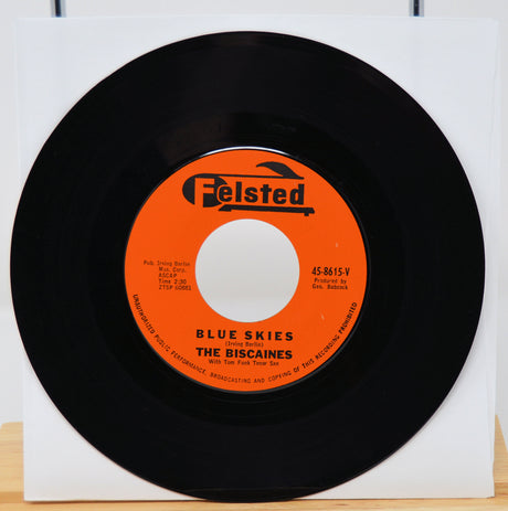 Vinyl record with orange label featuring 'Felsted' and 'Blue Skies' by 'The Biscaines'.