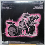 Vinyl record sleeve with black and white illustration of a band playing instruments on a pink background.