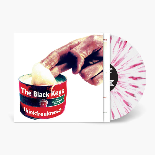 Vinyl record and container with 'The Black Keys' branding on a white background