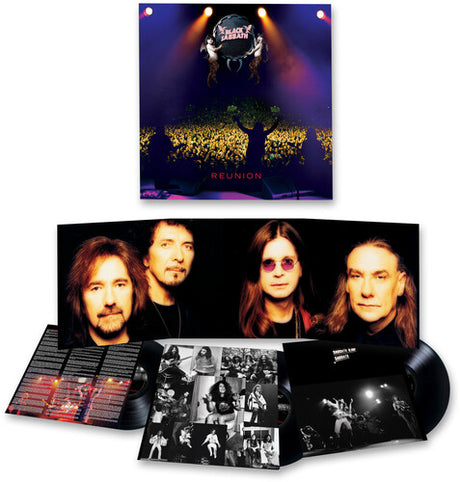 Vinyl record set with cover featuring band members and concert image, on a white background