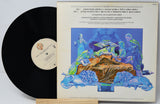 Vinyl record with colorful cover featuring classical music scene