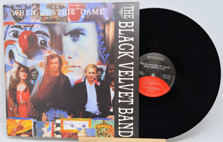 Vinyl record with cover featuring a collage of faces and text, on a white background