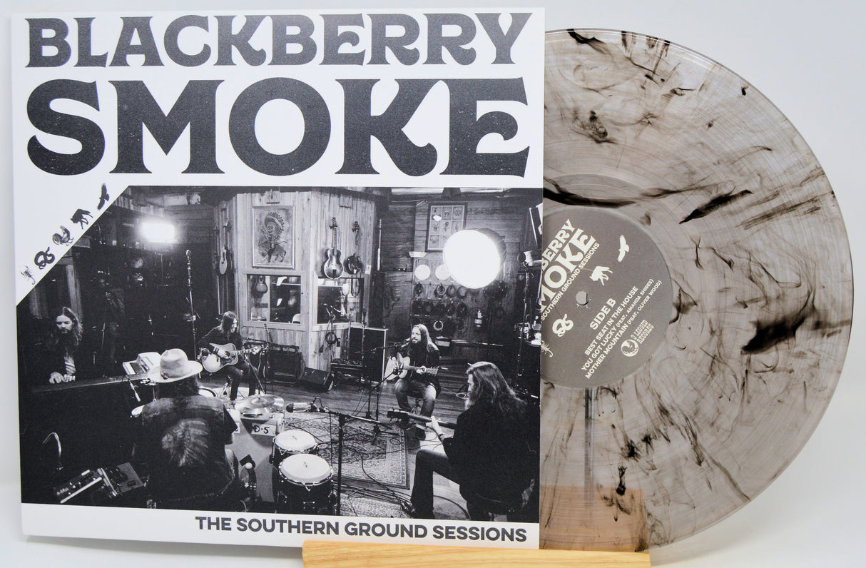 Blackberry Smoke 'The Southern Ground Sessions' vinyl record with the album cover in front and a marbled translucent record partially visible behind it on a small wooden stand.