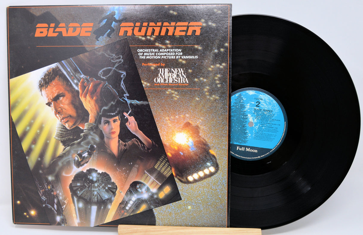 Vinyl record and cover for 'Blade Runner' with a sci-fi scene on the cover