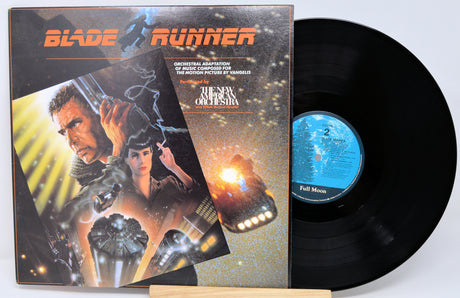 Vinyl record and cover for 'Blade Runner' with a sci-fi scene on the cover