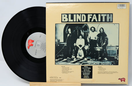 Vinyl record with 'Blind Faith' album cover featuring a band photo.