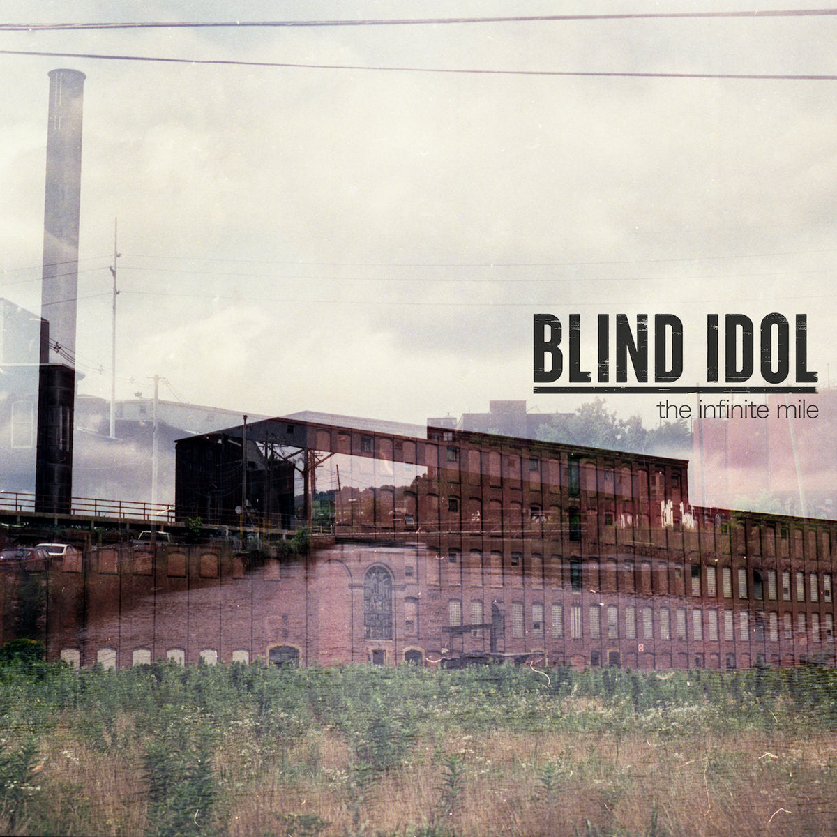 Blind Idol The Infinite Mile album cover featuring an abandoned brick factory with cloudy sky