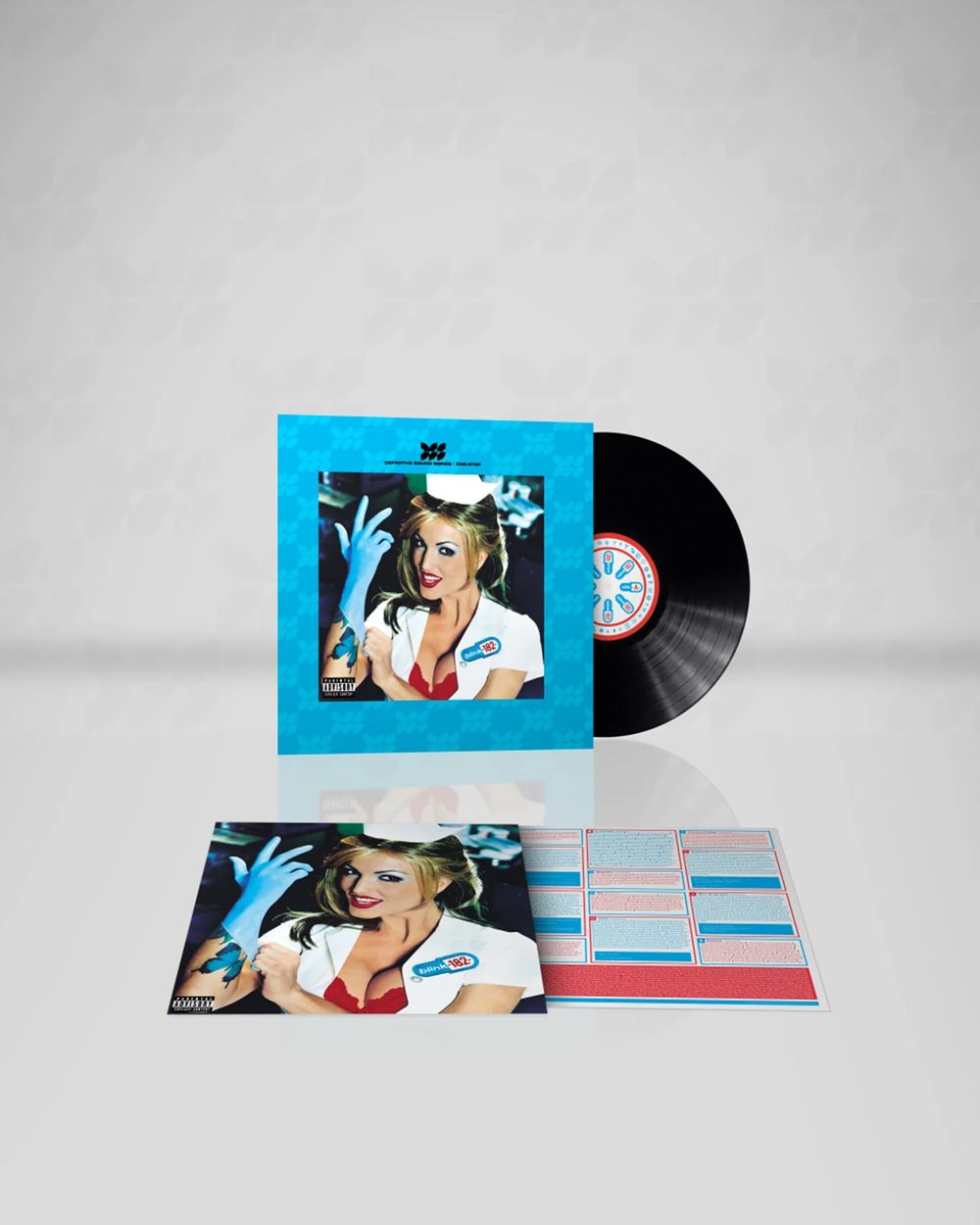 Vinyl record with cover featuring a stylized image of a person, on a light gray background