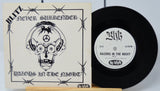 Vinyl record with cover titled 'Never Surrender' by Blitz on a light gray background.