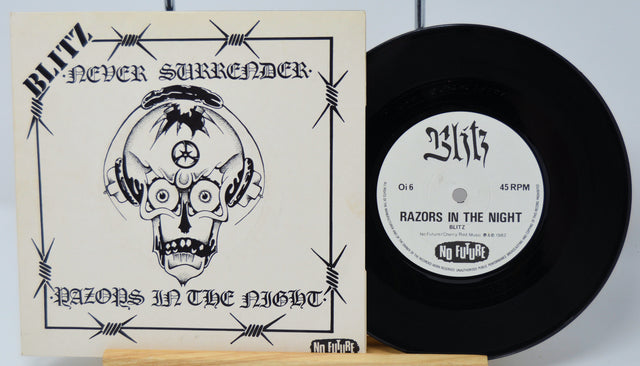 Vinyl record with cover titled 'Never Surrender' by Blitz on a light gray background.