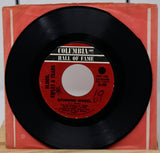 Vinyl record with red label on a red Columbia Hall of Fame sleeve