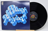 Vinyl record with 'Blues Project' cover on a white background