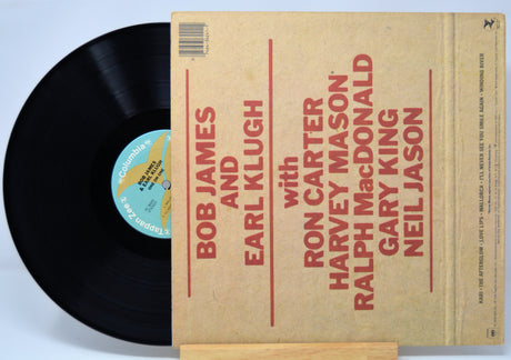 'Bob James And Earl Klugh One On One' Vinyl record with a beige cover featuring red text on a light blue background