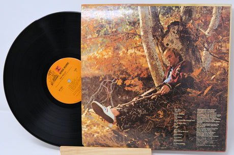 Back cover and vinyl record of Bob Mosley album with autumn foliage scene