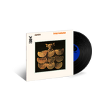 Vinyl record with cover featuring a stack of records and a bear, on a white background